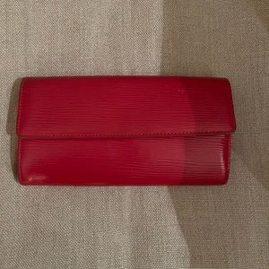 Louis Vuitton red epi Porte Tresor Internatiinal Wallet